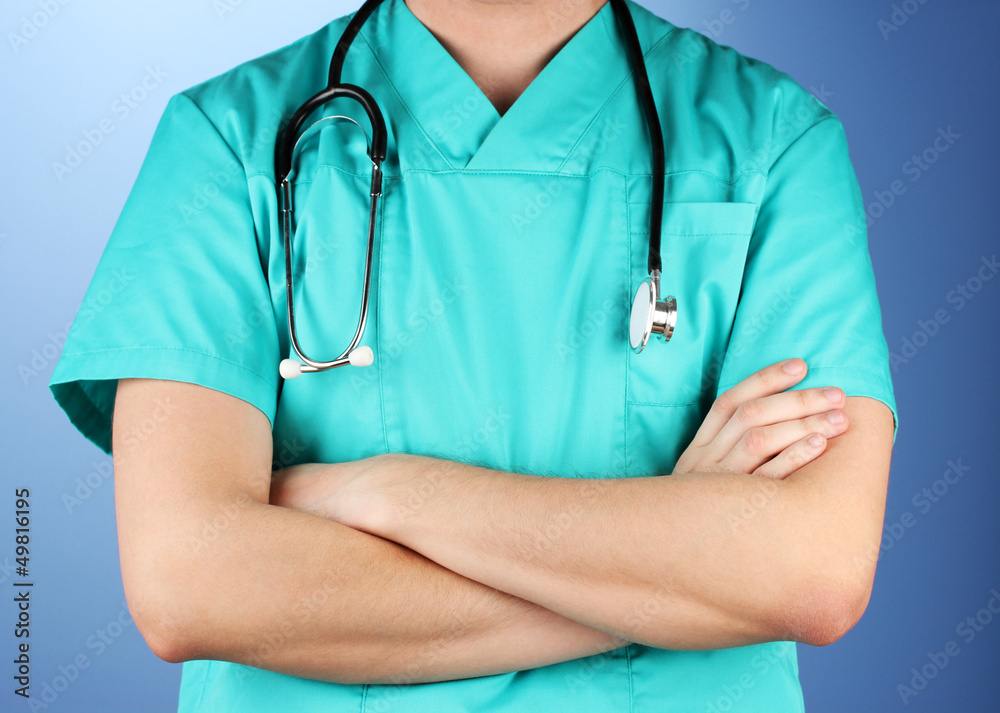 Doctor with stethoscope, on blue background Doctor with stethoscope, on blue background