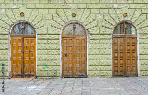 Three entrance - doors in old building