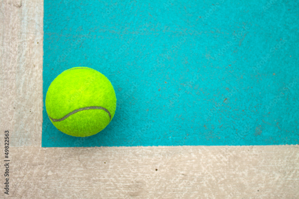 A tennis ball on court
