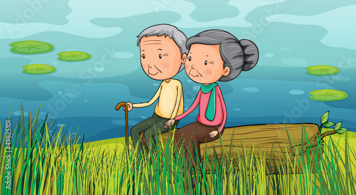 Two old people sitting near the lake