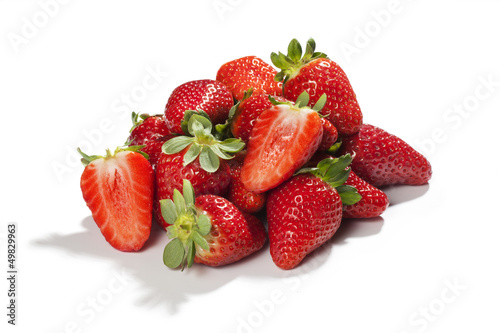 Fresh mature strawberries with leaves isolated 