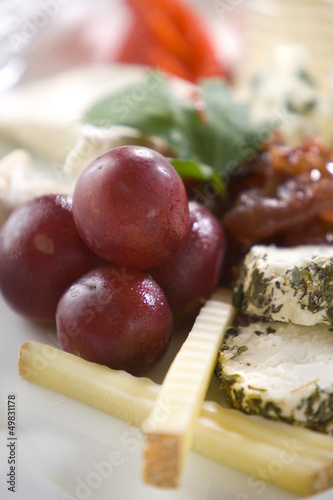 food styling with cheese and grapes