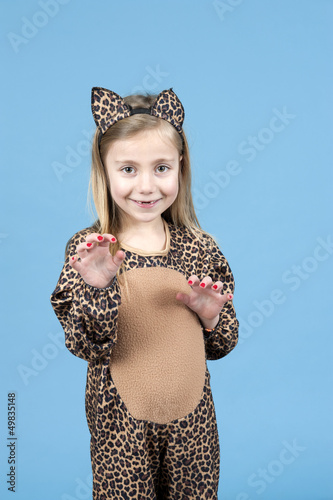 little girl disquised as a leopard on blue photo