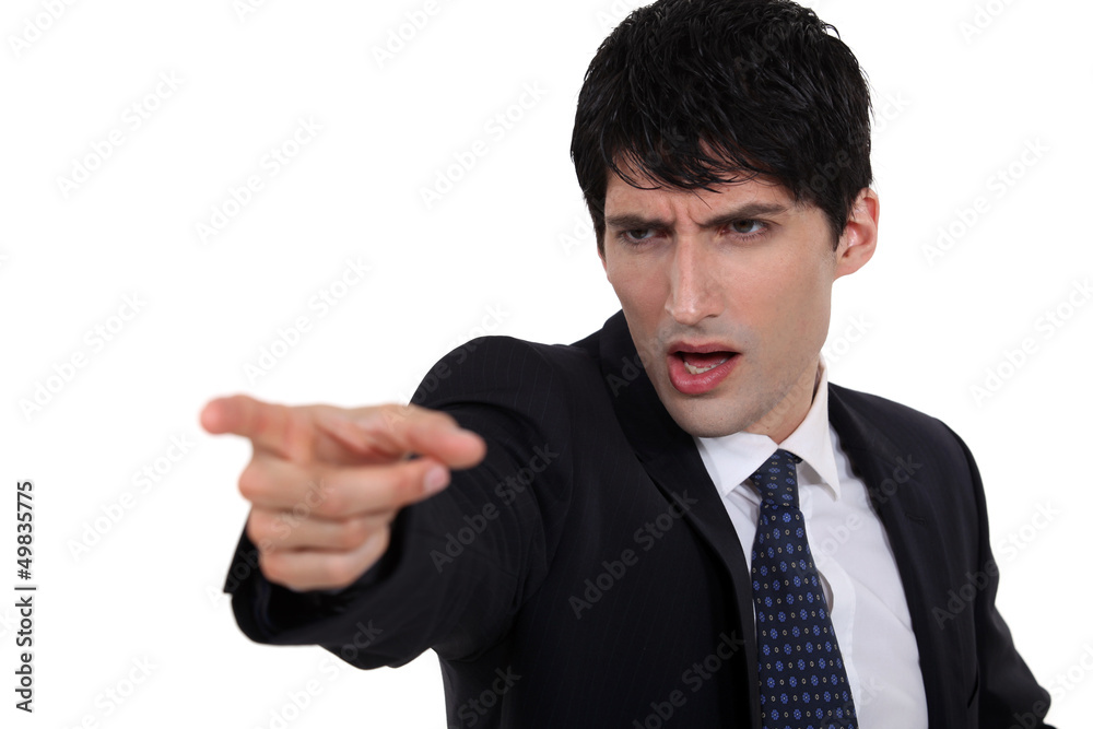 Aggressive businessman pointing