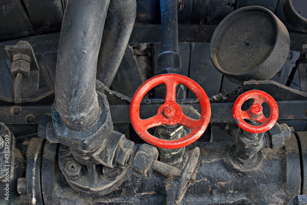 Fototapeta premium Engine room of a very old steam train
