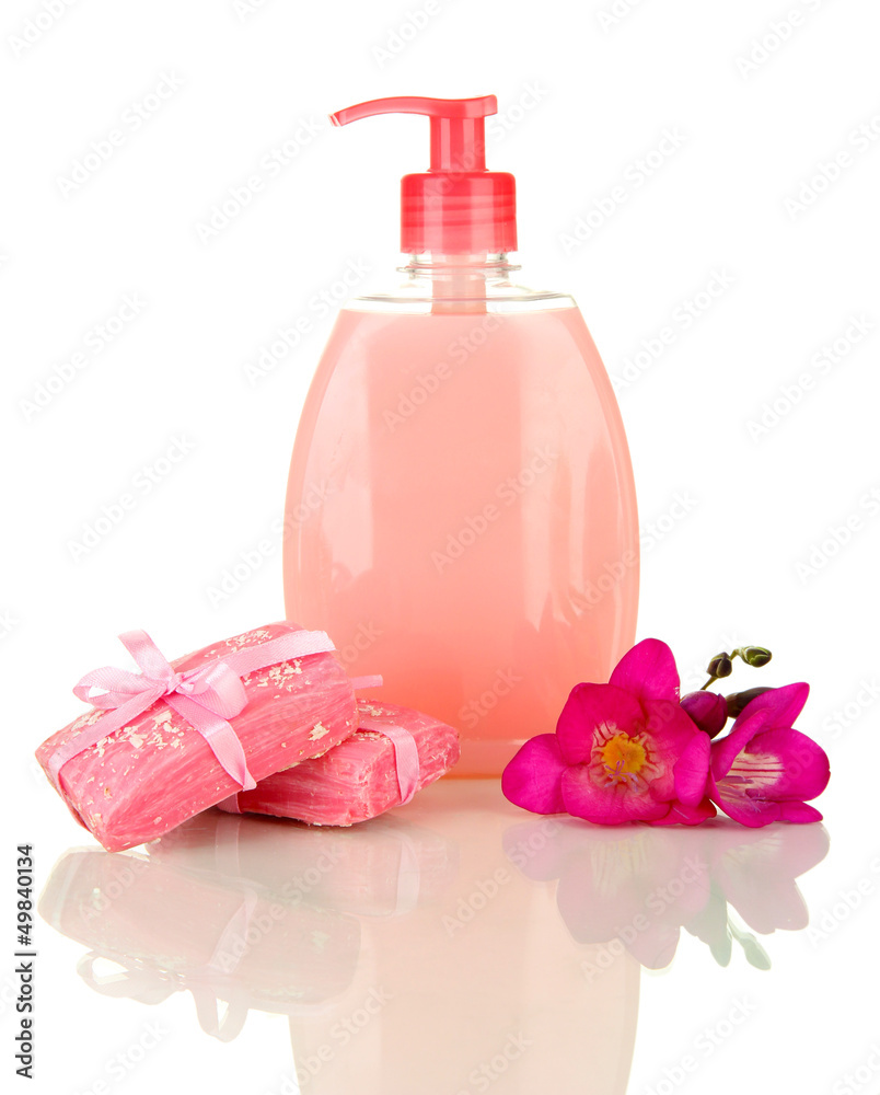 Liquid and hand-made soaps isolated on white Liquid and hand-made soaps isolated on white