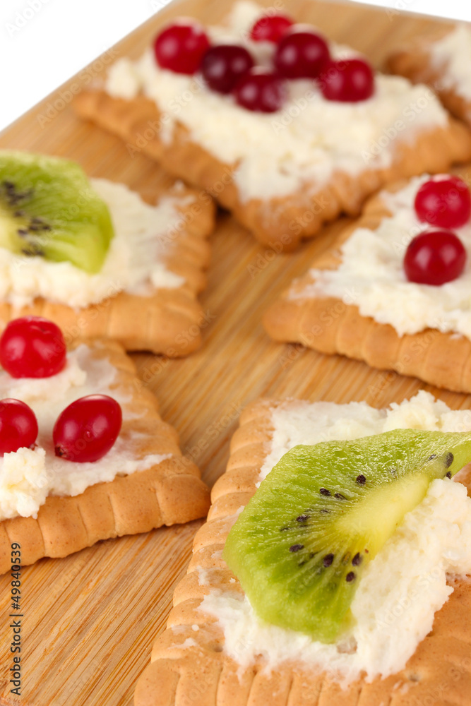 Cookie with cheese and cranberry, kiwi, on wooden background Cookie with cheese and cranberry, kiwi, on wooden background