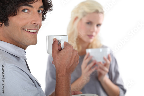 young couple drinking coffee together