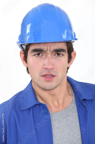 Concerned construction worker