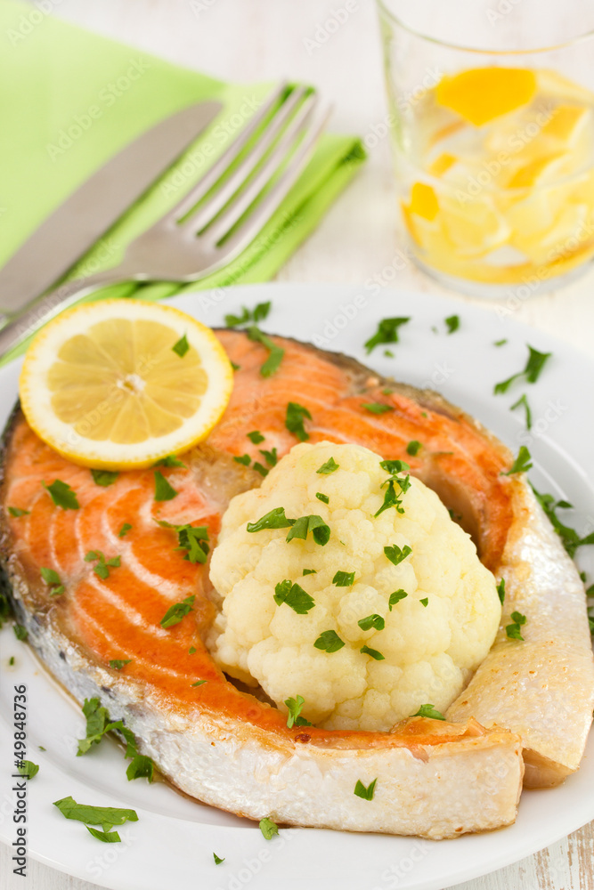fried salmon with boiled cauliflower and lemon fried salmon with boiled cauliflower and lemon