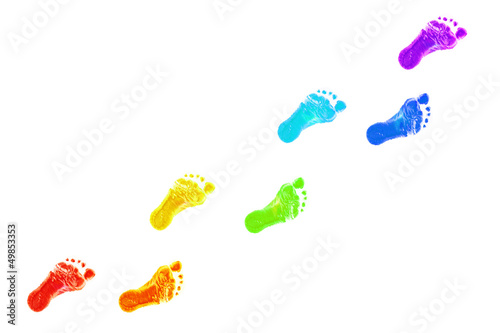 Baby foot prints all colors of the rainbow.