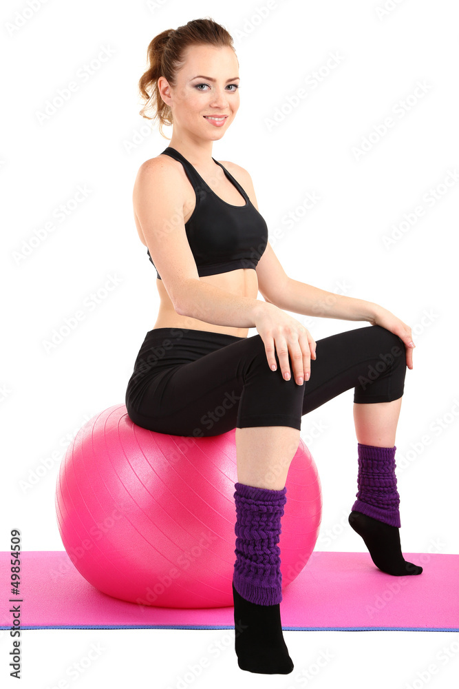 Young woman doing fitness exercises with gym ball isolated Young woman doing fitness exercises with gym ball isolated