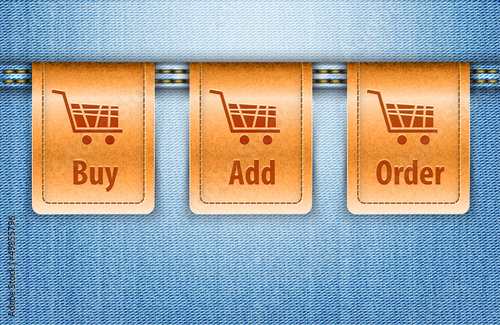 Blue jeans background with brown leather shopping labels