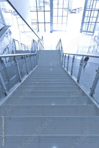 Escalator in modern interior toned © snvv