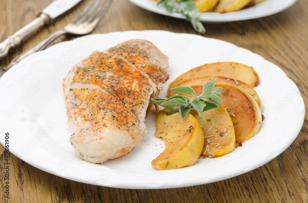 Baked chicken and saute quince with rosemary horizontal