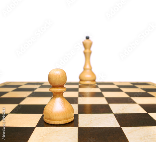 Chess. Pawn and queen. Symbol development or career growth.