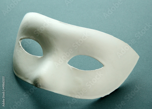 White mask, on grey background photo