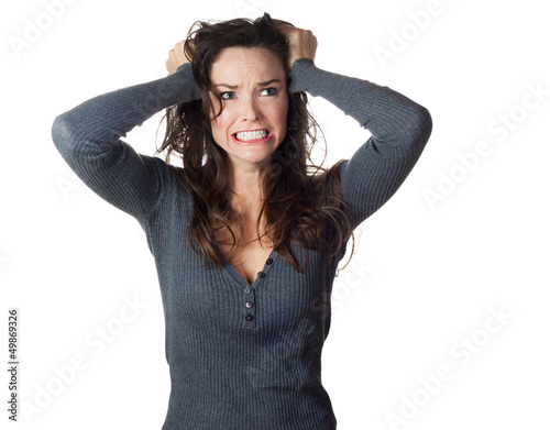 Frustrated woman pullinh ger hair