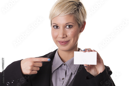 Beautiful woman smiles with a blank business card.