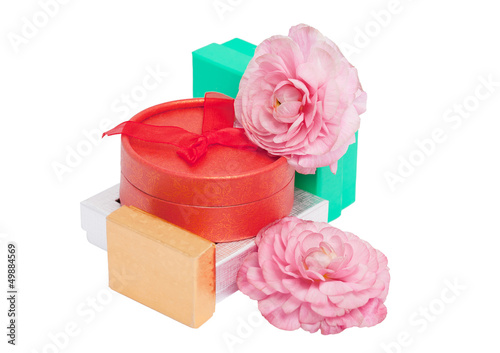 Gifts and flowers around a red box