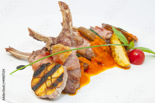 roasted veal ribs with vegetables 