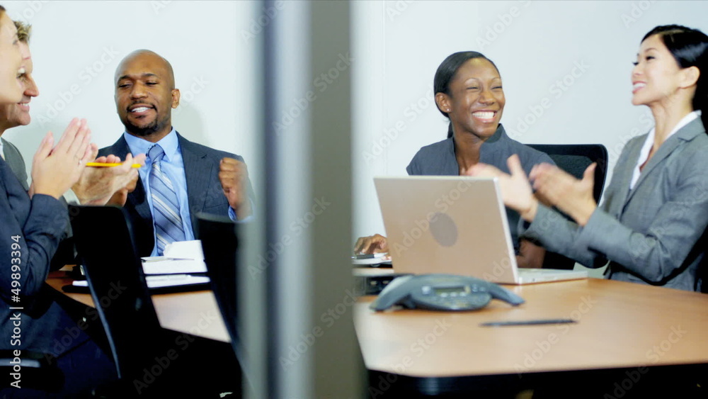 Multi Ethnic Business Team Receiving Good News Multi Ethnic Business Team Receiving Good News