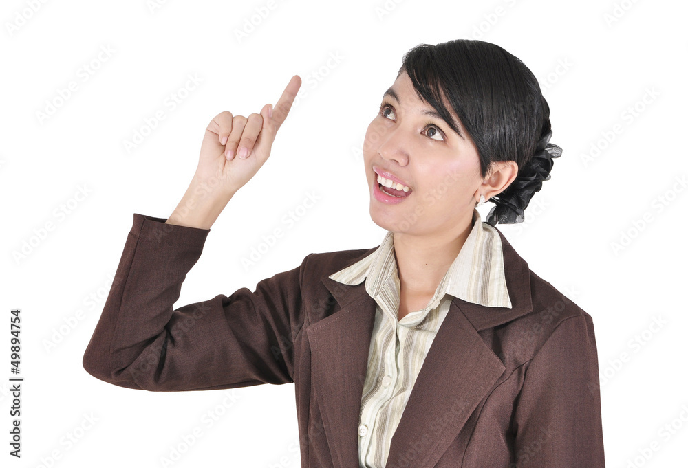 Young beautiful female business executive pointing, isolated Young beautiful female business executive pointing, isolated