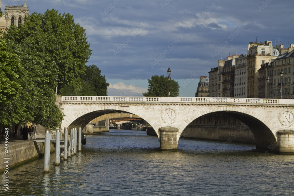 Arch bridge across the river, Pont Au Change, Seine River, Paris