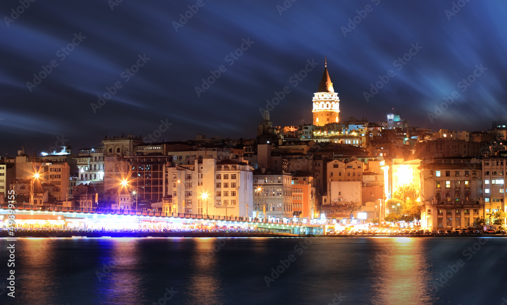 View of Istanbul and Galata tower and bridge at night