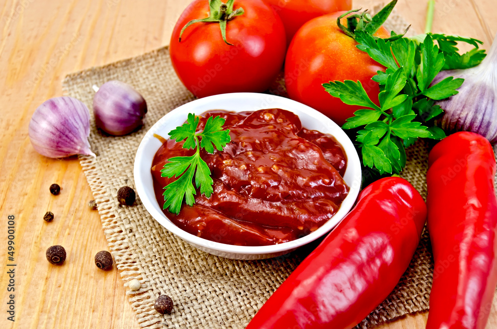 Ketchup with vegetables on a napkin burlap Ketchup with vegetables on a napkin burlap