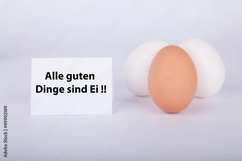 Drei Eier zwei weiß eins braun mit Spruch Stock Photo Adobe Stock