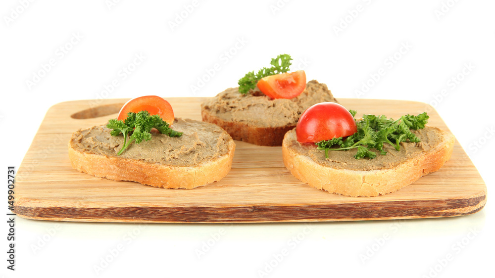 Fresh pate on bread on wooden board, isolated on white Fresh pate on bread on wooden board, isolated on white