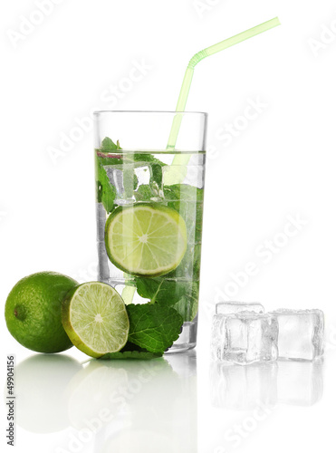 Glass of water with ice, mint and lime isolated on white