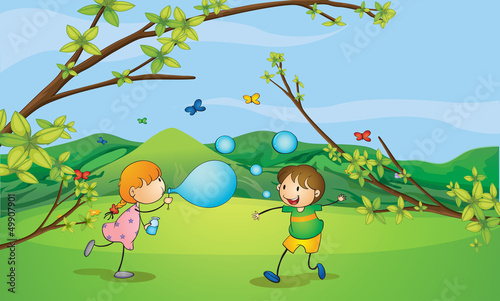 Kids playing blowing bubbles