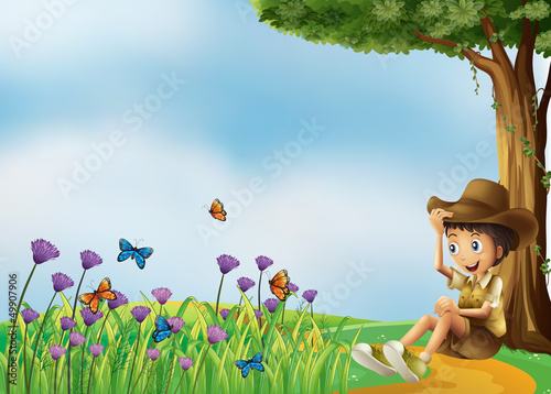 A young man resting in front of the butterflies