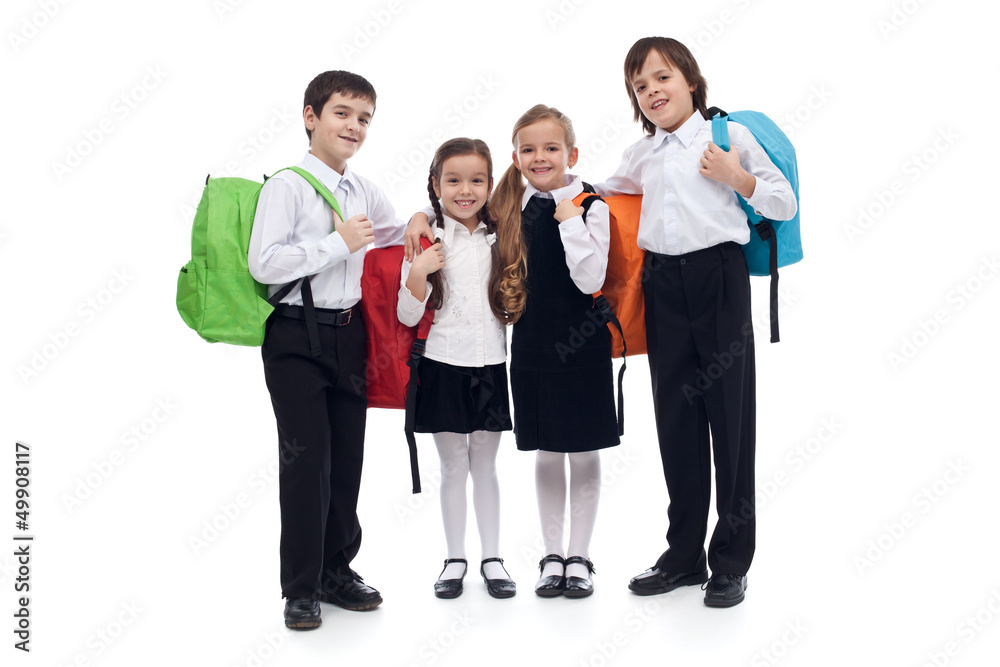 Happy elementary school kids with colorful back packs Happy elementary school kids with colorful back packs