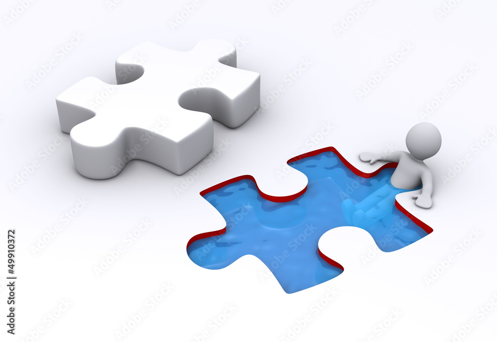 Person is inside puzzle shaped pool and puzzle piece Person is inside puzzle shaped pool and puzzle piece