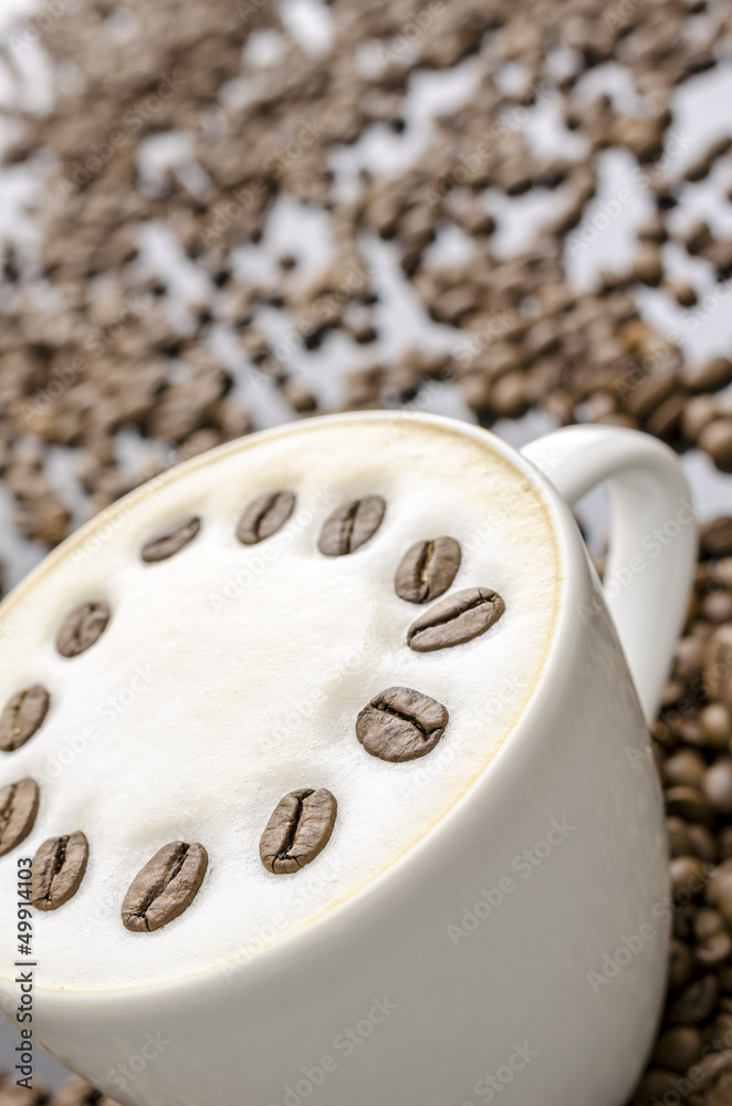 Coffee with blurred coffee beans Coffee with blurred coffee beans