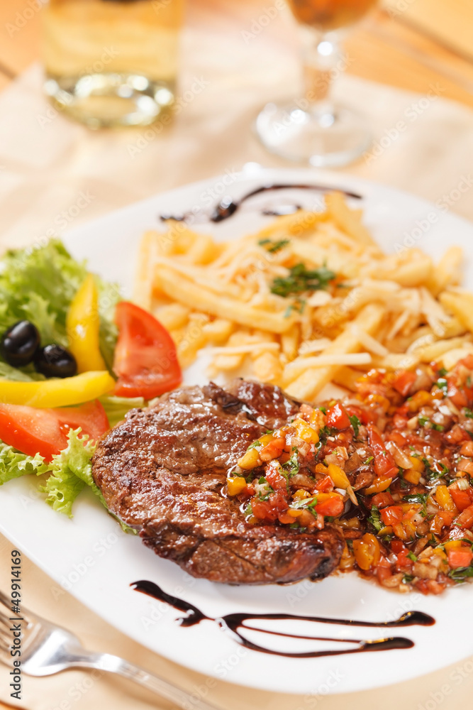 grilled steak with french fries