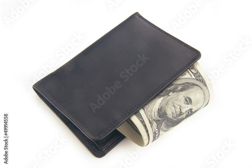 US dollars in a black wallet isolated on white