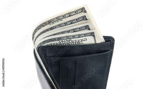 US dollars in a black wallet isolated on white