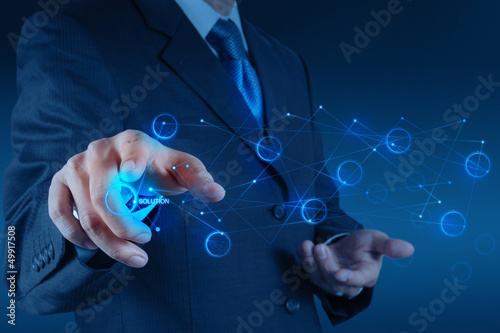 businessman hand pushing solution graph on a touch screen