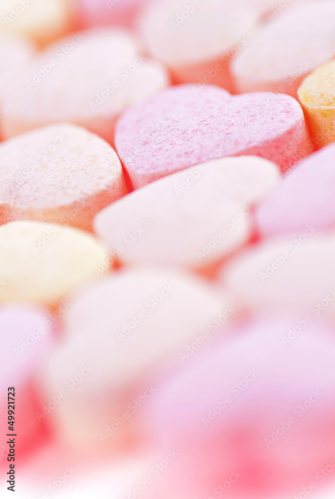 Sweet hearts shaped pink and orange Sugar Pills. Soft Focus.