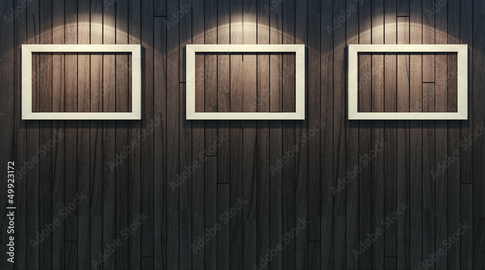 Three picture frames on wooden wall Three picture frames on wooden wall