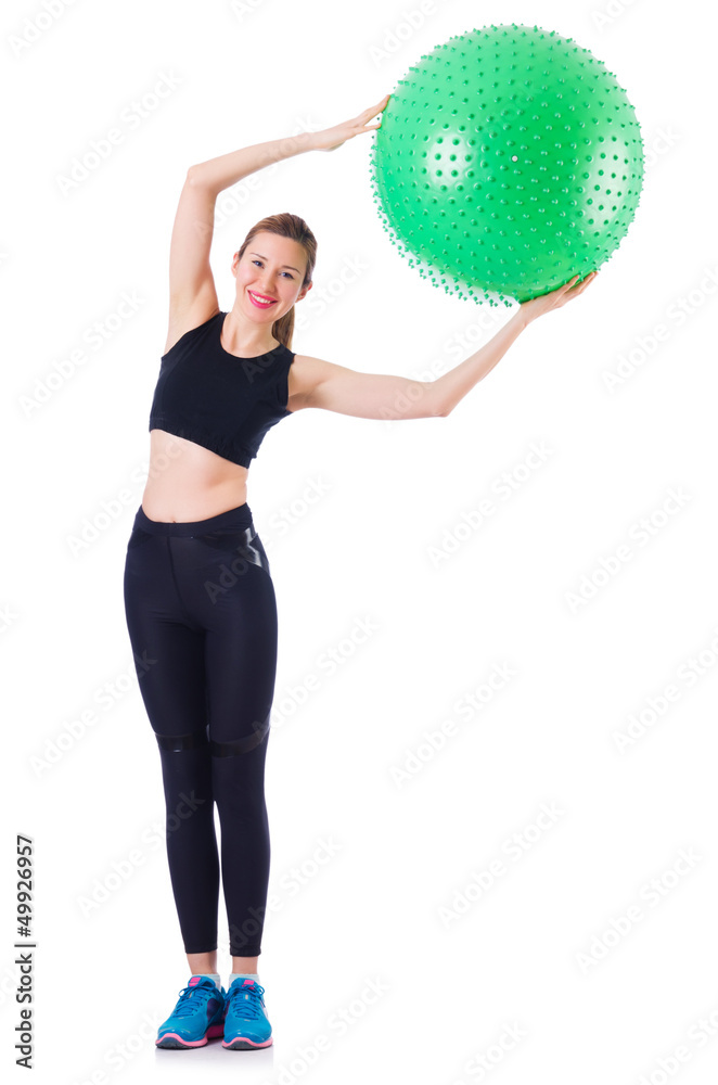 Young girl with swiss ball doing exercise Young girl with swiss ball doing exercise