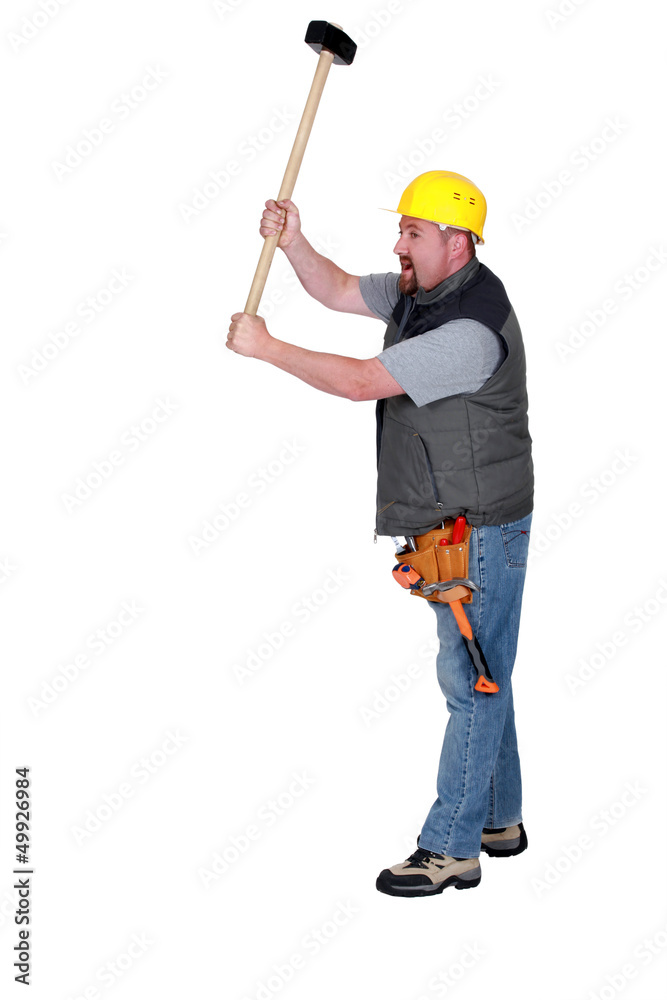 Tradesman holding a mallet