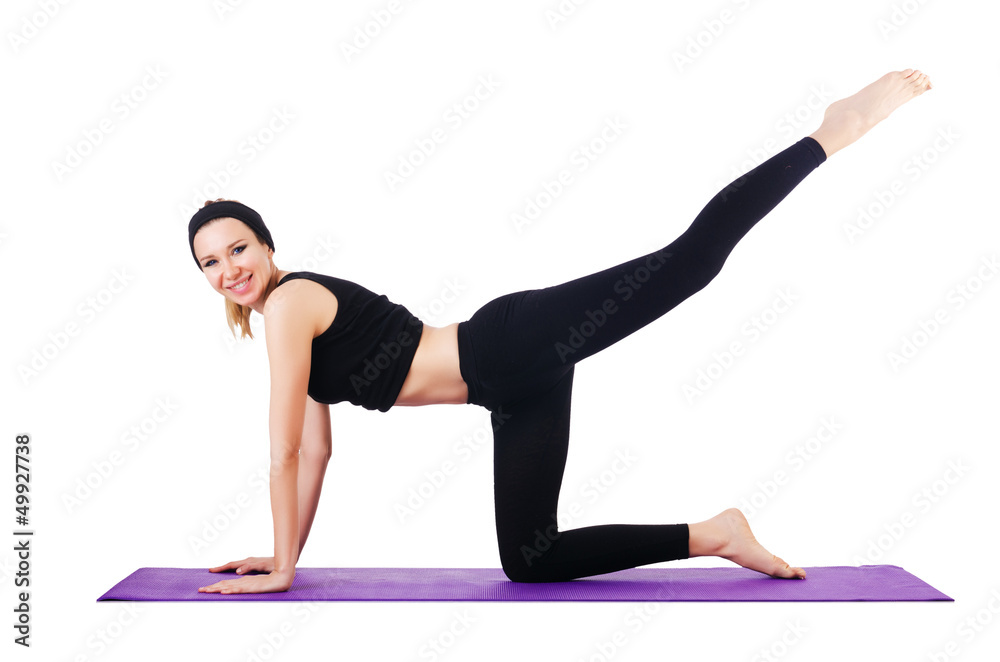 Young female doing exercises on white Young female doing exercises on white