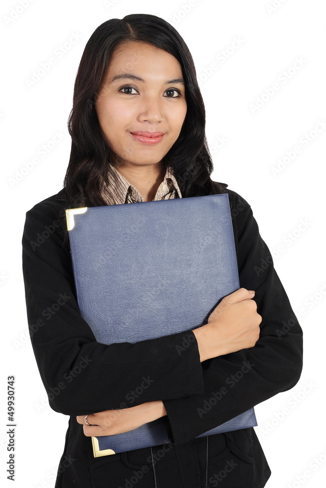 beautiful businesswoman holding a book and a pen beautiful businesswoman holding a book and a pen