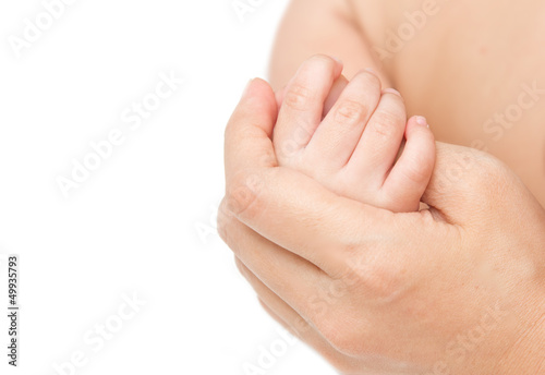 Mother holding her baby's hand together,touch of love