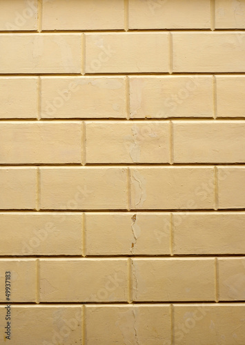Foto wall plastered in brick style. vertical composition